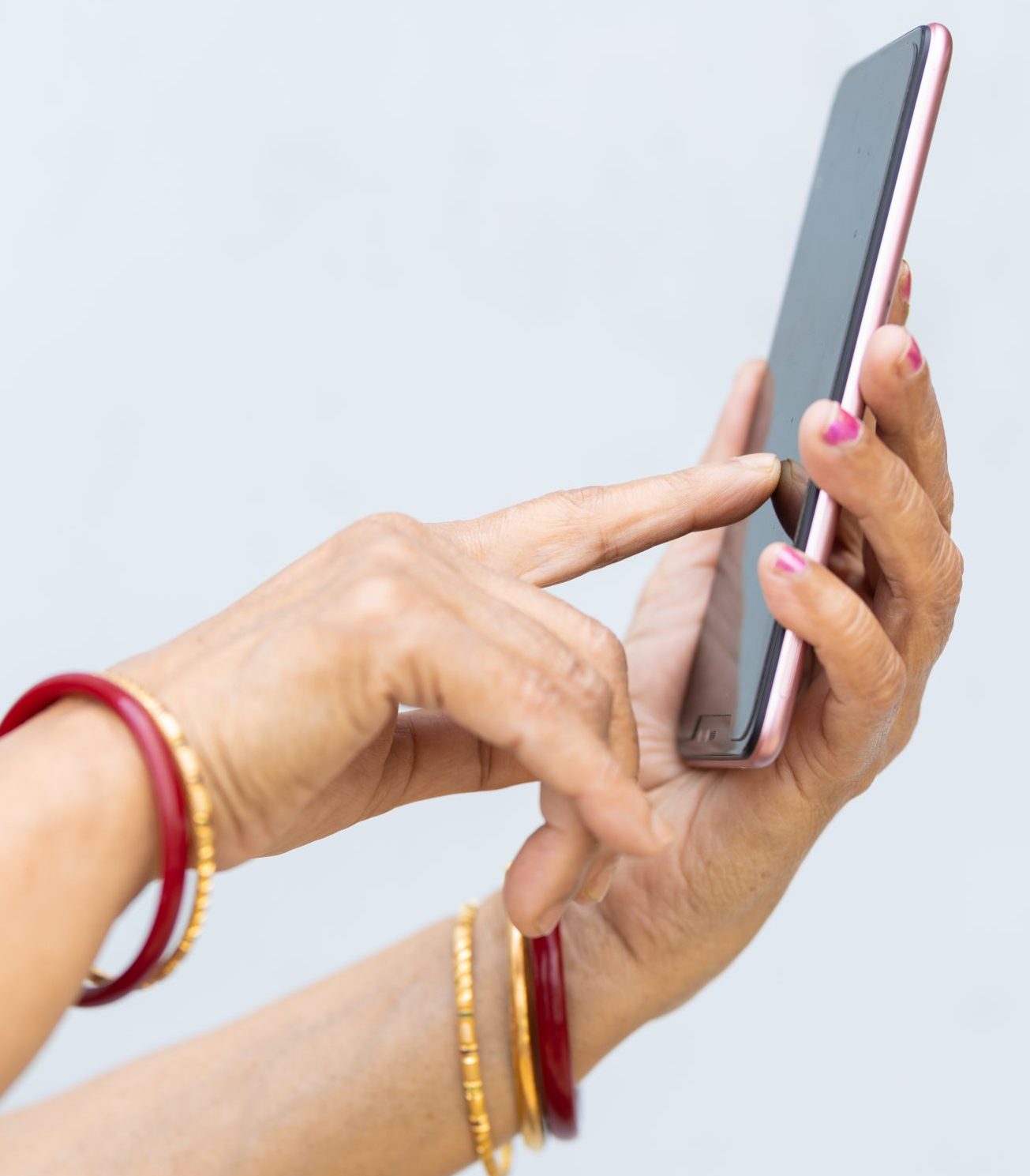 hands of a female using a smartphone to click a call to action