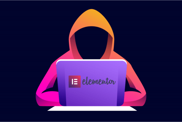 cartoon representation of hacker behind laptop with elementor pro vulnerability