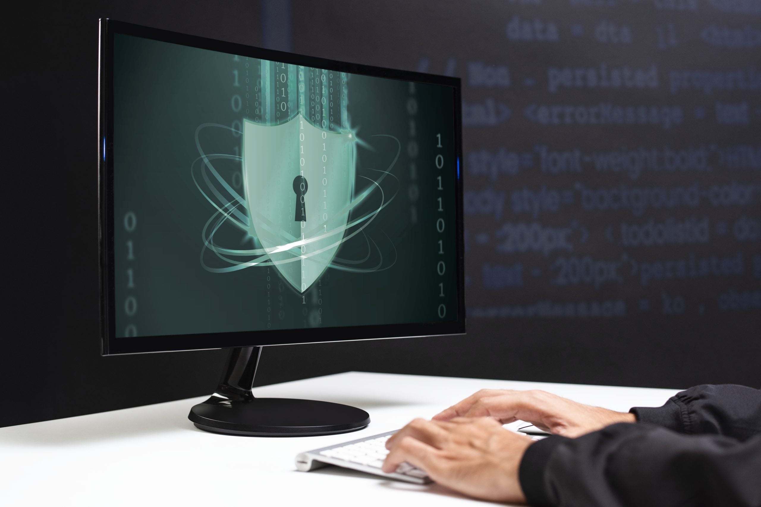 Hacker blocked by firewall security image on desktop monitor