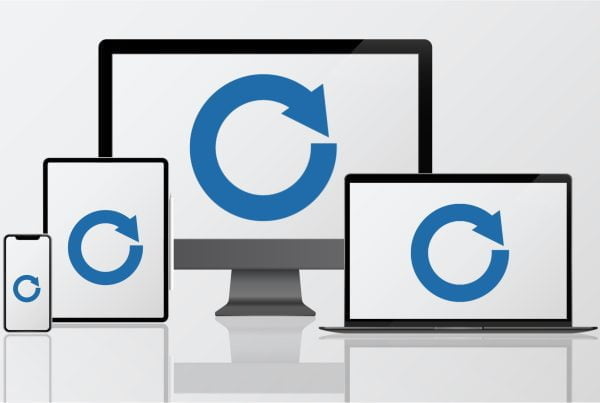 collection of devices with refresh symbol representing our website refresh checklist